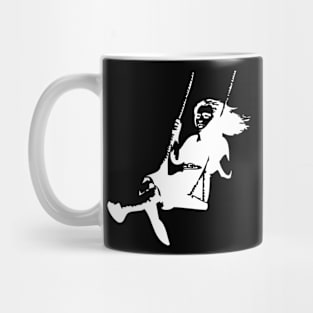 A girl on a swing Mug